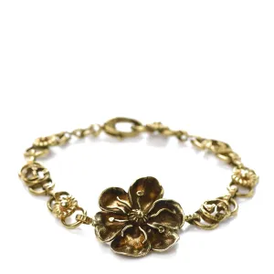 Gucci Metal Floral Bracelet in Aged Gold