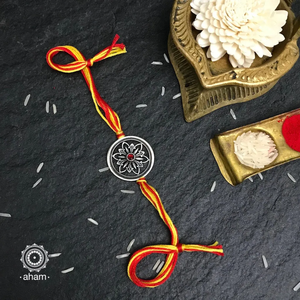 Silver Dial Flower Rakhi
