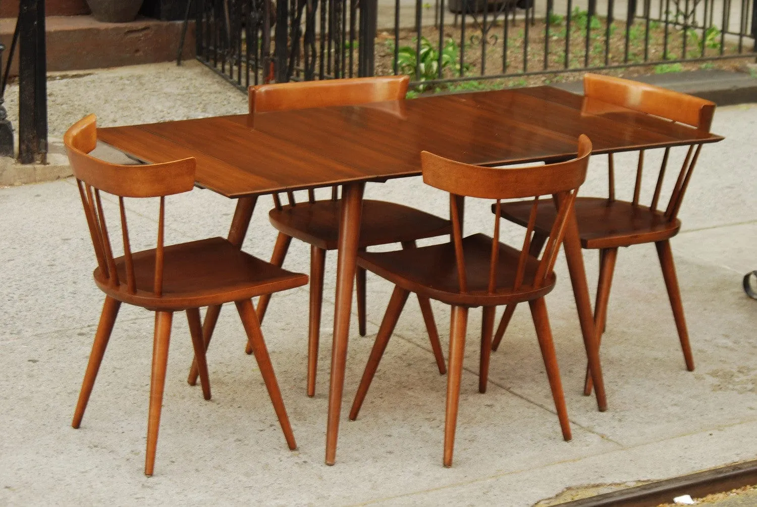 SOLD -- PAUL MCCOBB COMPACT DINING SET WITH TWO LEAVES AND FOUR CHAIRS