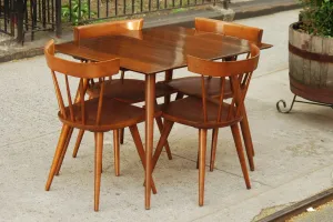 SOLD -- PAUL MCCOBB COMPACT DINING SET WITH TWO LEAVES AND FOUR CHAIRS
